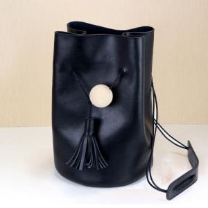 Minimal Leather Bucket Bag With Tassel Detailing